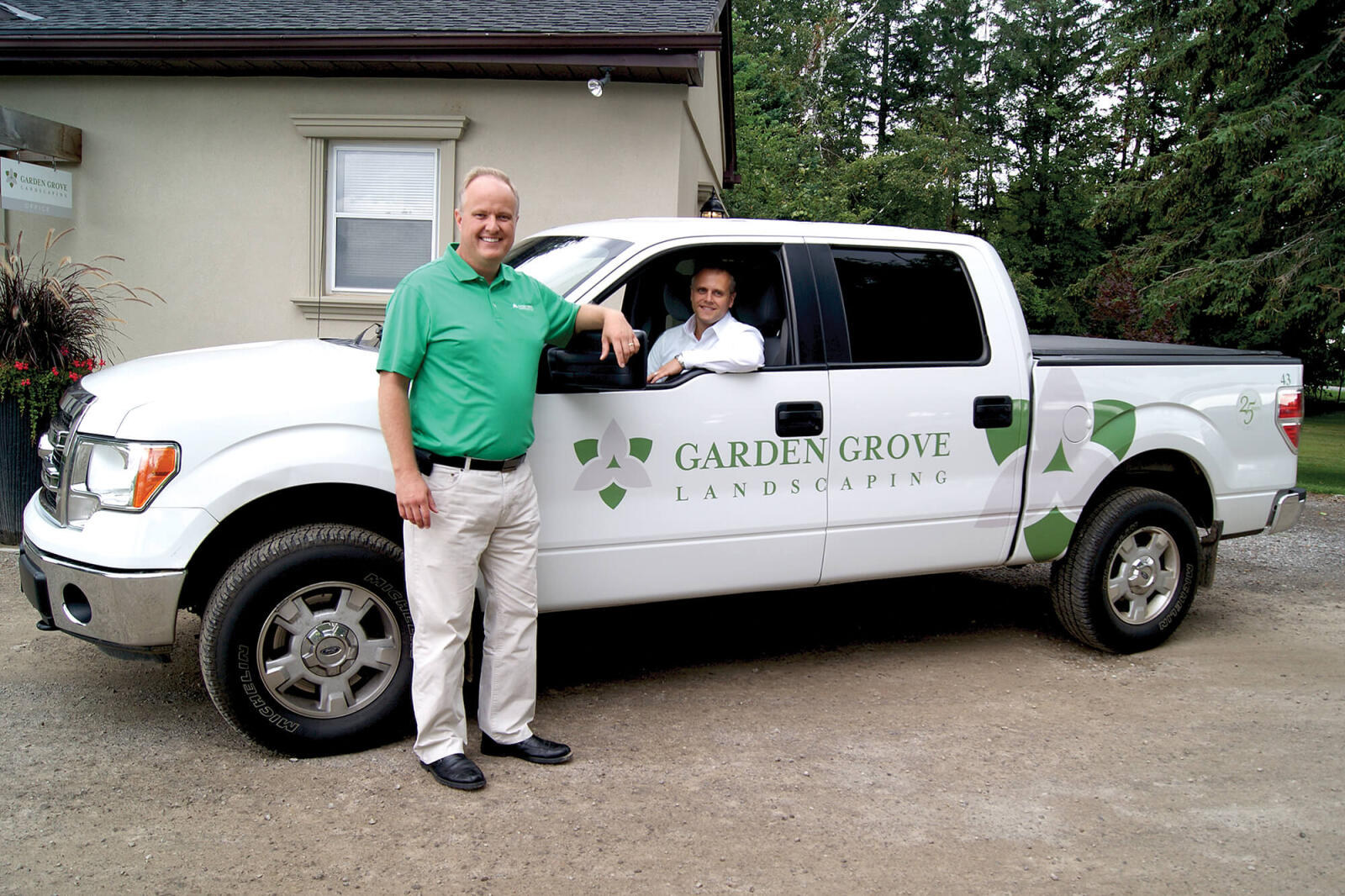 David Lammers, standing, and his brother Paul are celebrating 25 years of success operating their business, Garden Grove Landscaping in Waterdown.