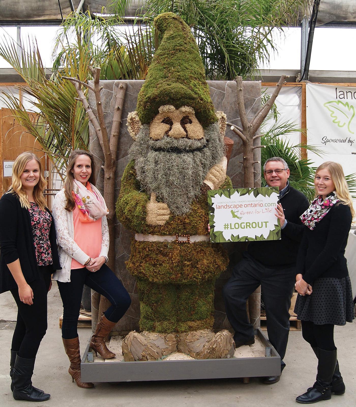 Grout the giant gnome is ready for a starring role in 2016 with his team of LO membership department staff, from left, Cassandra Wiesner, Rachel Cerelli, Denis Flanagan and Myscha Burton.