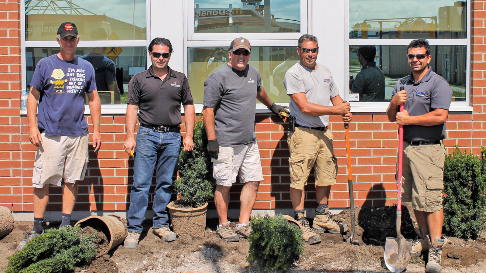 Members of Windsor Chapter lent their creative talents to improve the Safety Village of Windsor. In photo, from left, are some of those members, Dan Garlatti, Joe Santarossa Jr., Chris Power, Darren O’Grady and Sal Costante.
