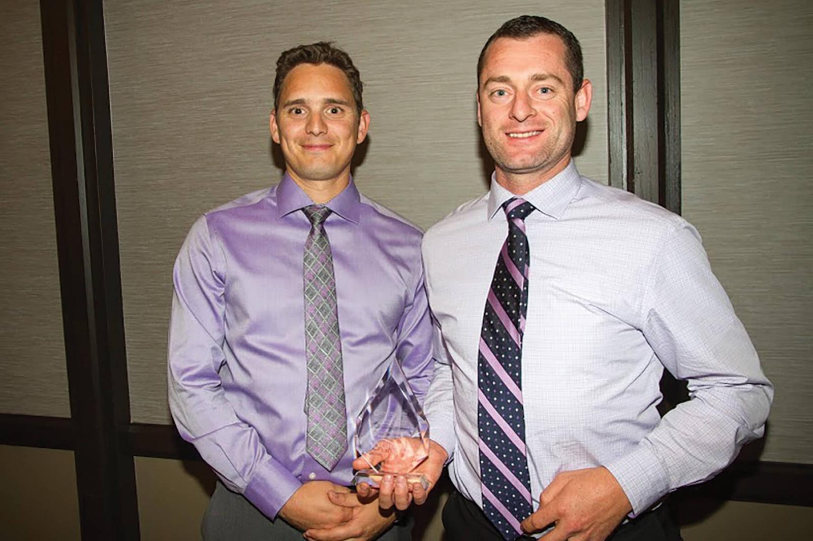 Dutchmaster Nuseries was named Canada’s Grower of the Year at the Awards of Excellence ceremonies in Winnipeg. In photo, Dave Tillaart, left, and Matt Tillaart proudly hold their trophy.