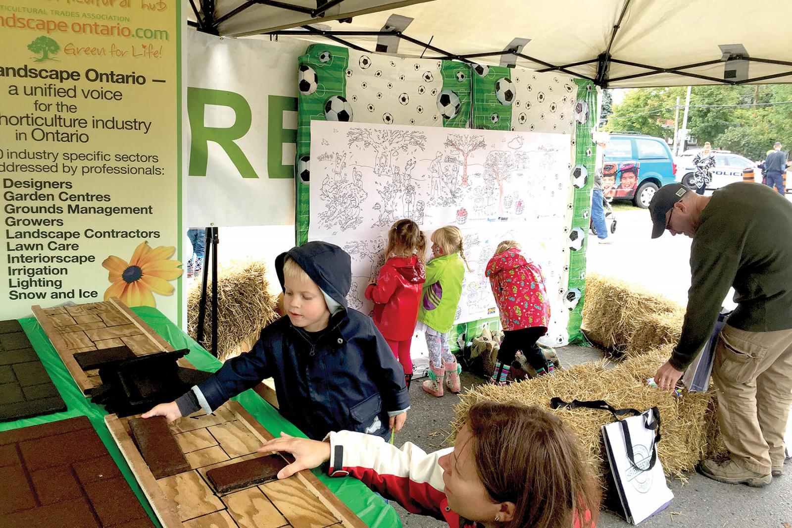 A giant colouring board and wood carvings attracted a great deal of attention to the Landscape Ontario Durham Chapter display at the Brooklin/Whitby Harvest Festival.