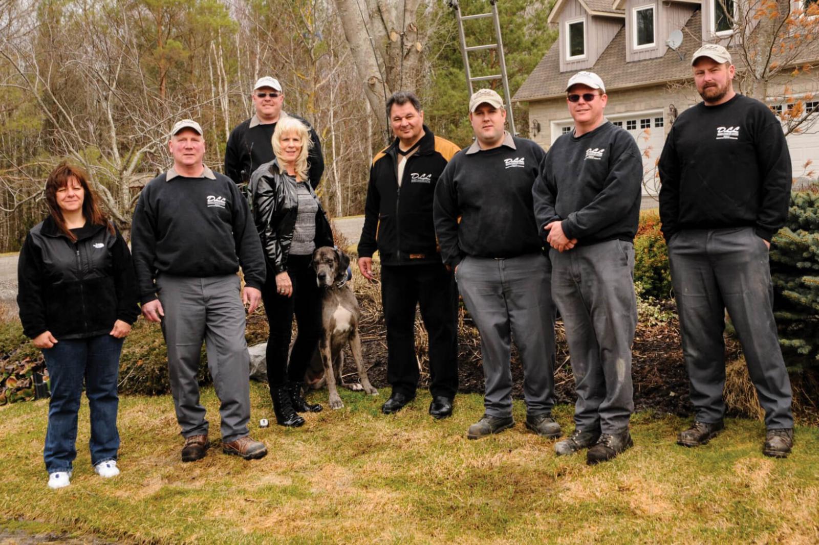 DiMarco Landscape Lighting crew. From left, Laurie Barnes, Joe Willemse, Nick Brazier, Theresa DiMarco, Frank DiMarco, Stew Dunn, Wyatt Lambert and Kevin Mitchell.