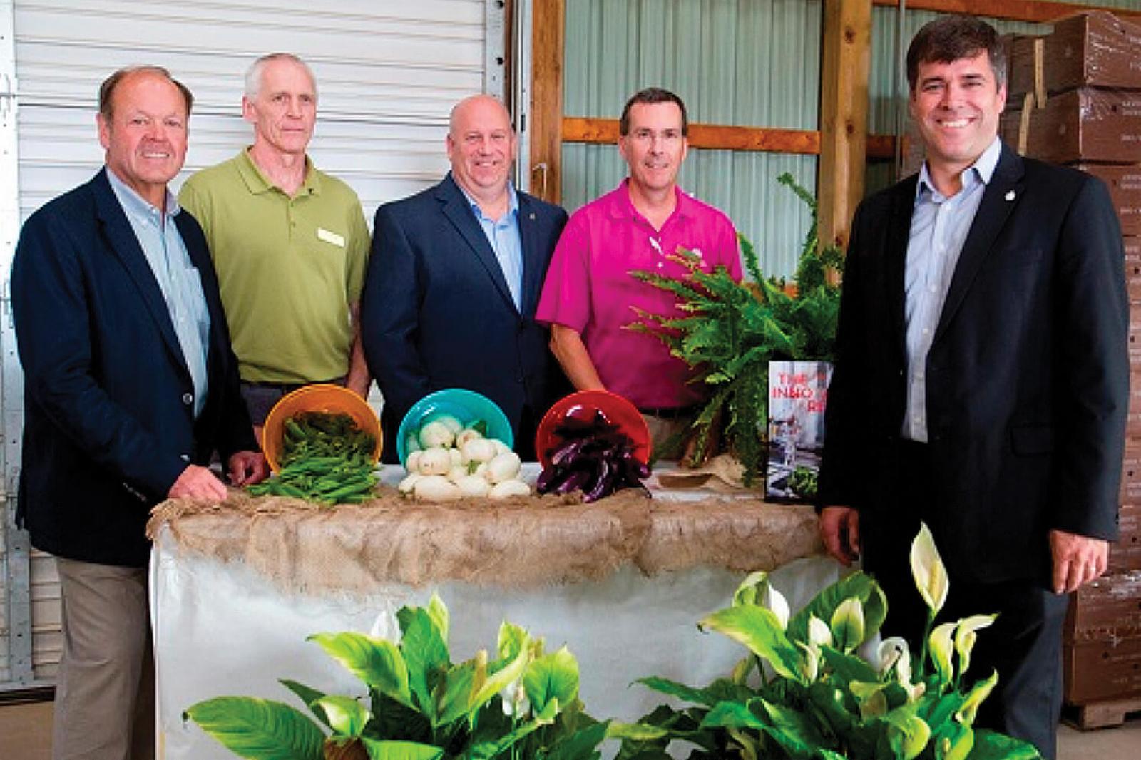 From left: John F.T. Scott, Chair, Vineland’s Board of Directors; Dr. Michael Brownbridge, Research Director, Horticultural Production Systems at Vineland; Dean Allison, member of Parliament for Niagara West—Glanbrook; Dr. Daryl Somers, Research Director, Applied Genomics at Vineland; Pierre Lemieux, Parliamentary Secretary to Agriculture Minister Gerry Ritz.