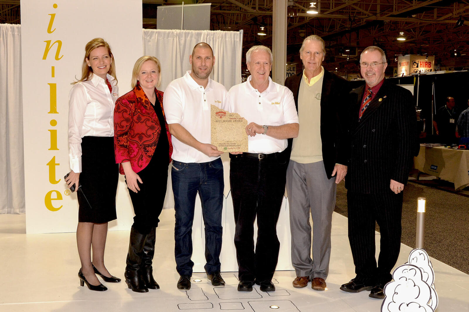 The Paul J. Day Best of Show Award went to In-Lite Design. On hand to present the award to In-Lite representatives, are from left Heather MacRae, show manager; Beth  Edney CLD, chair of the show committee; In-Lite representatives Ramon Pieters, president; and Jim Stangier; award’s namesake Paul Day; and committee vice-chair Brian Cocks CLT.