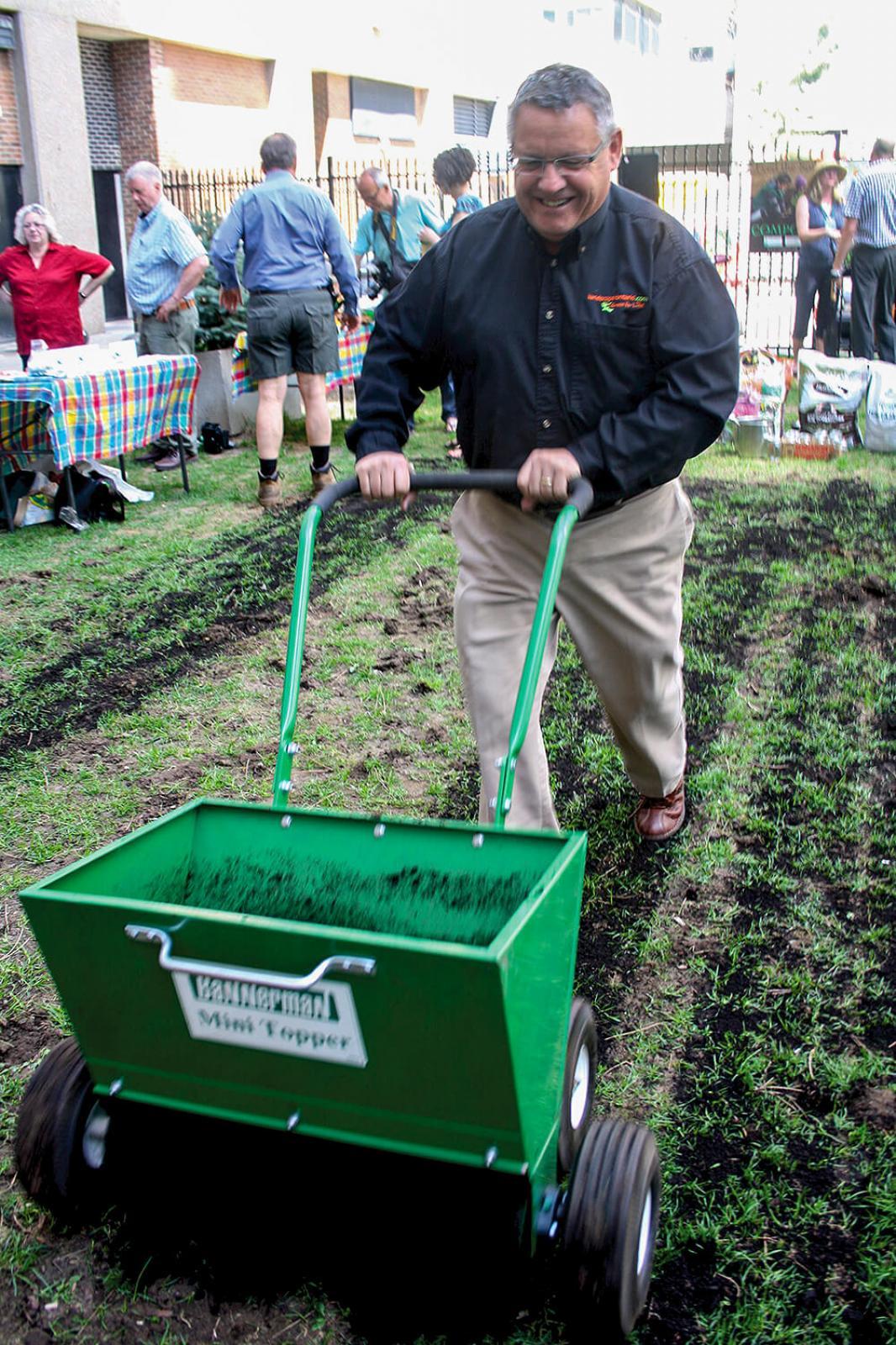 LO’s public relations director Denis Flanagan proved he is not just another pretty face, when he took on the task improving the soil at Compost Awareness Week at a site in downtown Toronto.