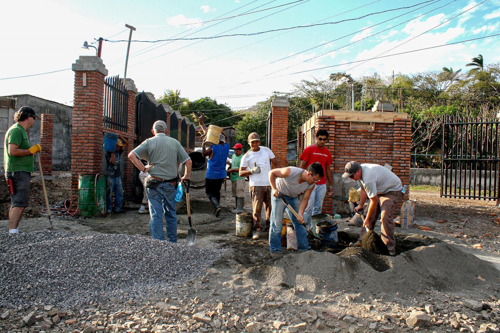 Members of Rockscape Design of Port Sydney help excavate soil for new school in Nicaragua.