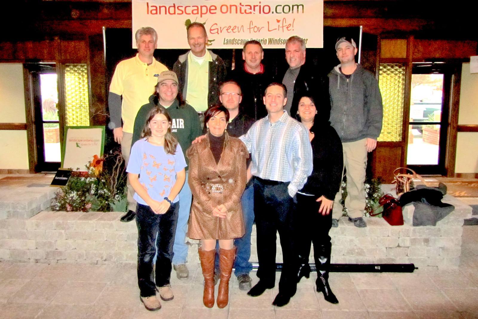 Some of the Windsor Chapter members took a break at the annual Windsor Home Show. They are in front, from left, Nicole Hall, Jim Martin, Kenny McEwan, Olivia Bellaire, Mike Bellaire, Jay Rivait. In back, from left, Dan Garlatti, Don Tellier, Tom Davis, Chris Power and Bob Bellaire.