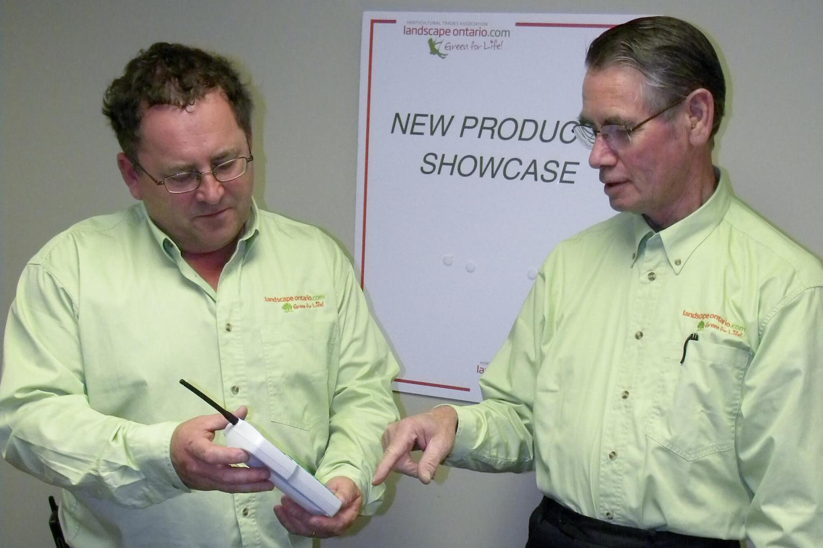 LO show committee members, Terry Childs (left) and Klaas Sikkema look over one of the new products that will be on display at this year’s New Product Showcase at Congress 2011.