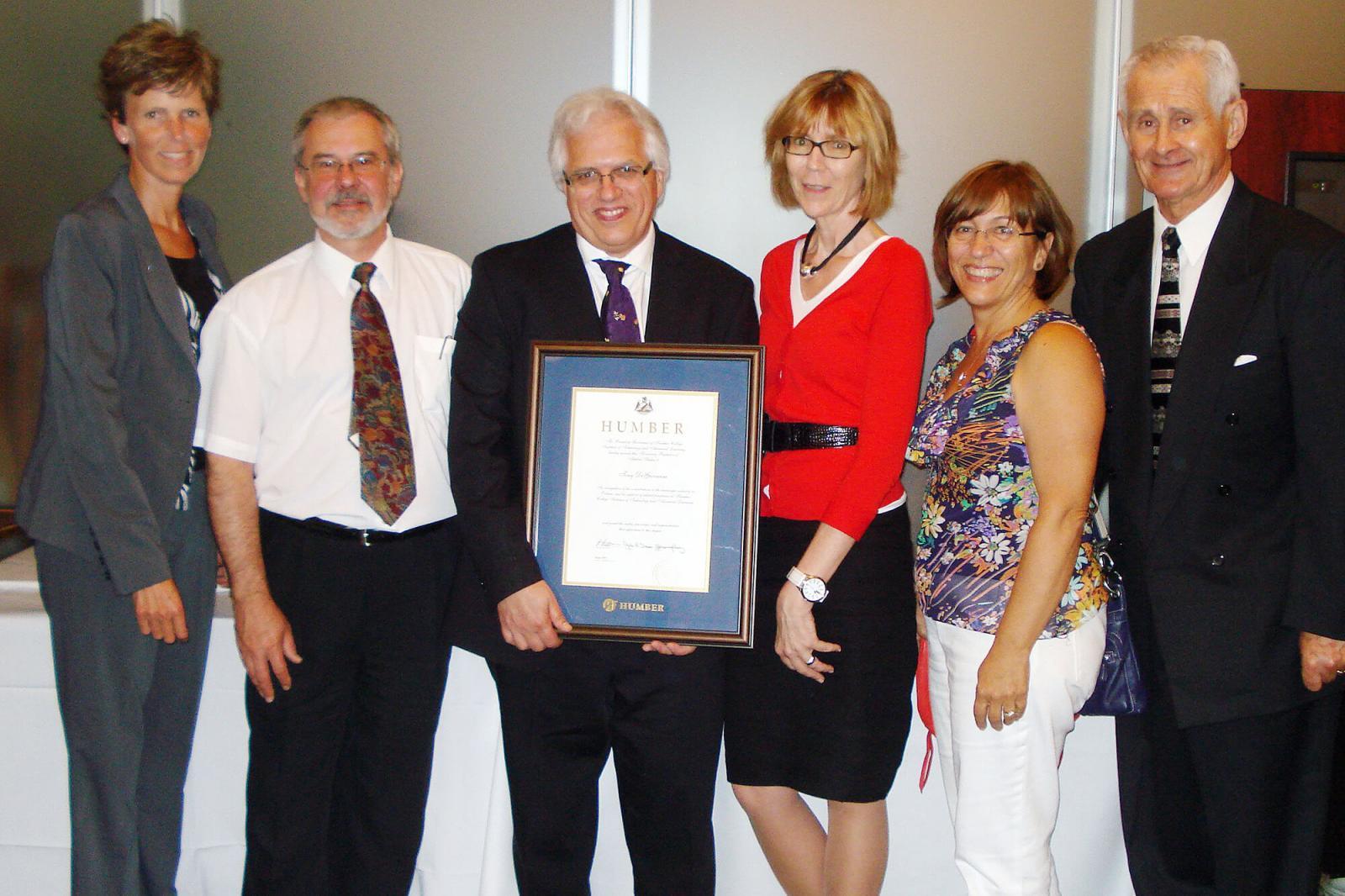 From left, Sally Harvey, LO education and labour manager; Joe Tomona, associate dean, Humber College School of Applied Technology; honouree Tony DiGiovanni; Denise Devlin-Li, dean, School of Applied Technology; Anna Marie DiCarlo, sister of Tony DiGiovanni and Terry Murphy, retired Landscape Ontario human resources manager and Humber instructor.