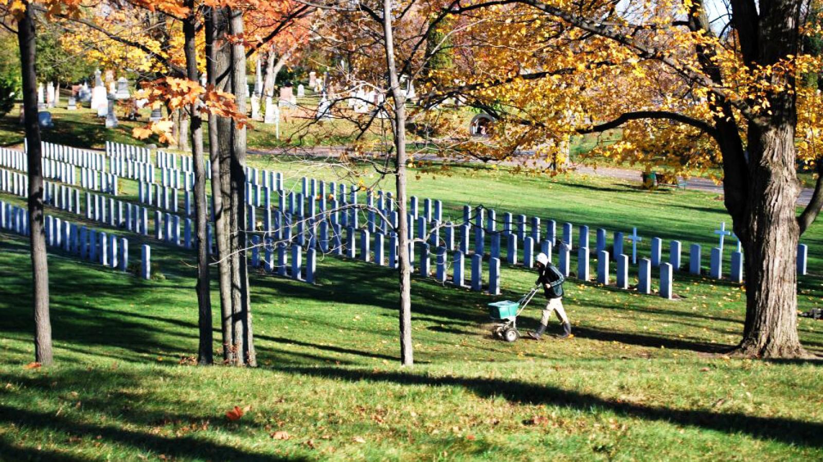 LO volunteers keep the military cemetery beautiful.