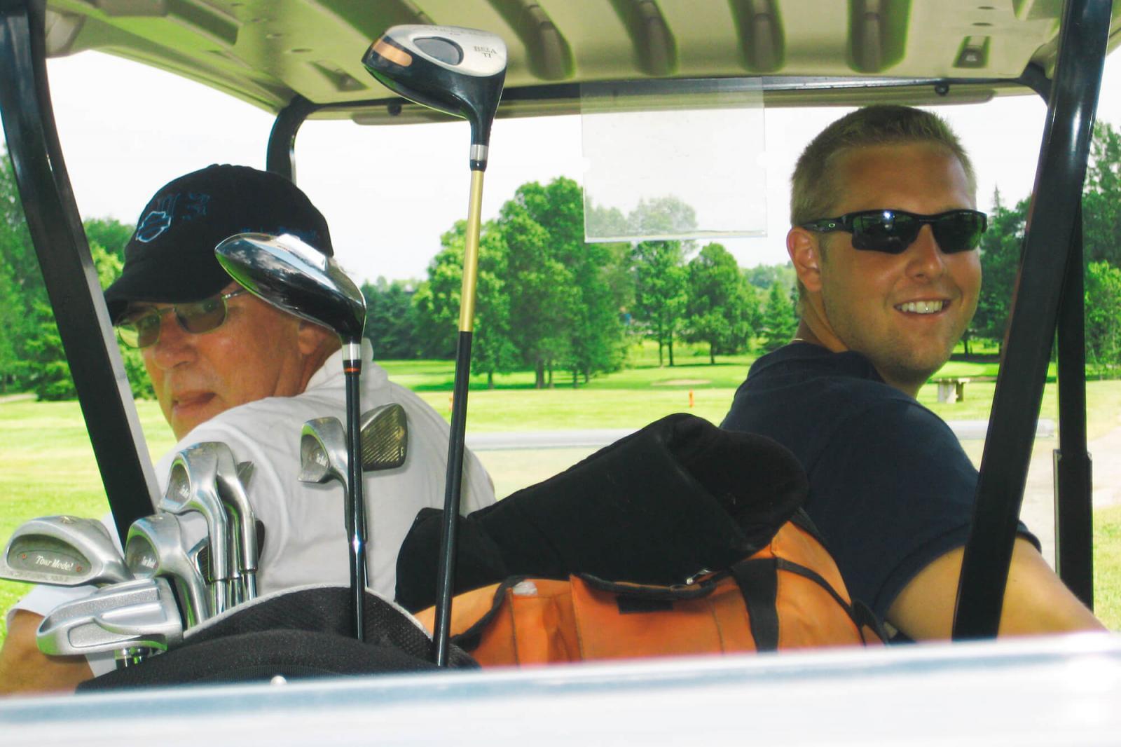 Eric Price, left, and Bill Cross of Thornbusch Landscaping Company enjoyed the day at the Upper Canada Golf Tournament on July 16.