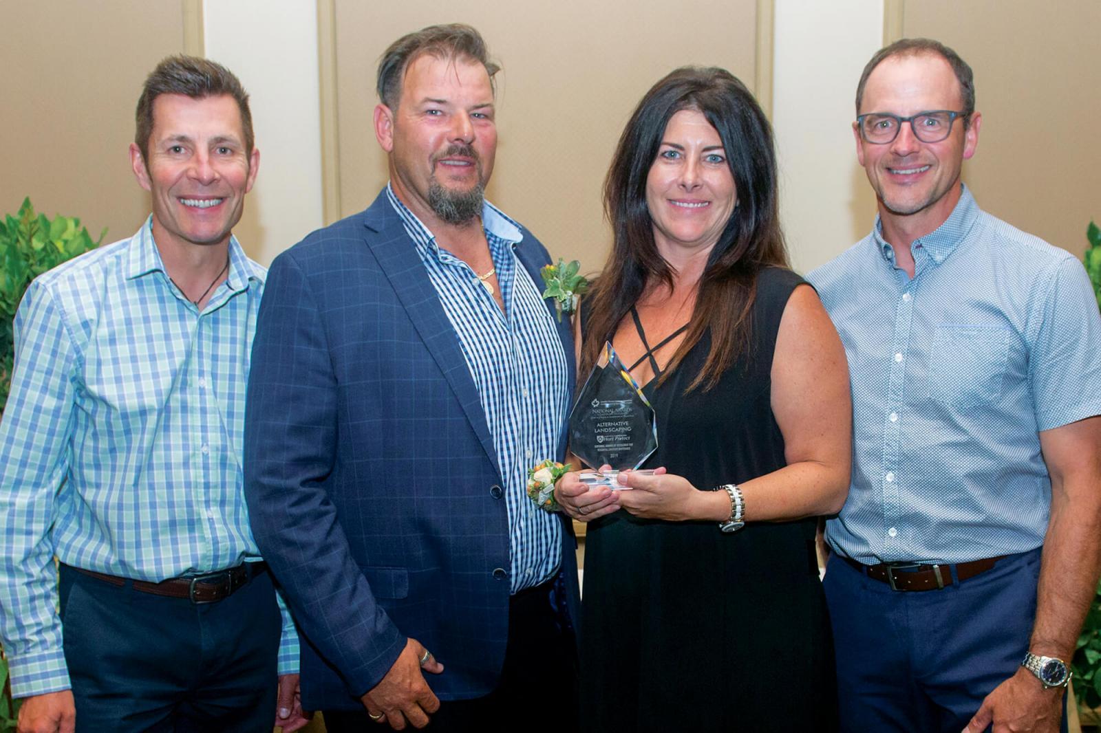 Chris and Karen Griffin of Alternative Landscaping received national recognition for residential maintenance at the CNLA awards gala held recently in B.C. They were joined by Rob Officer, left, and Guy Dowhy at right.