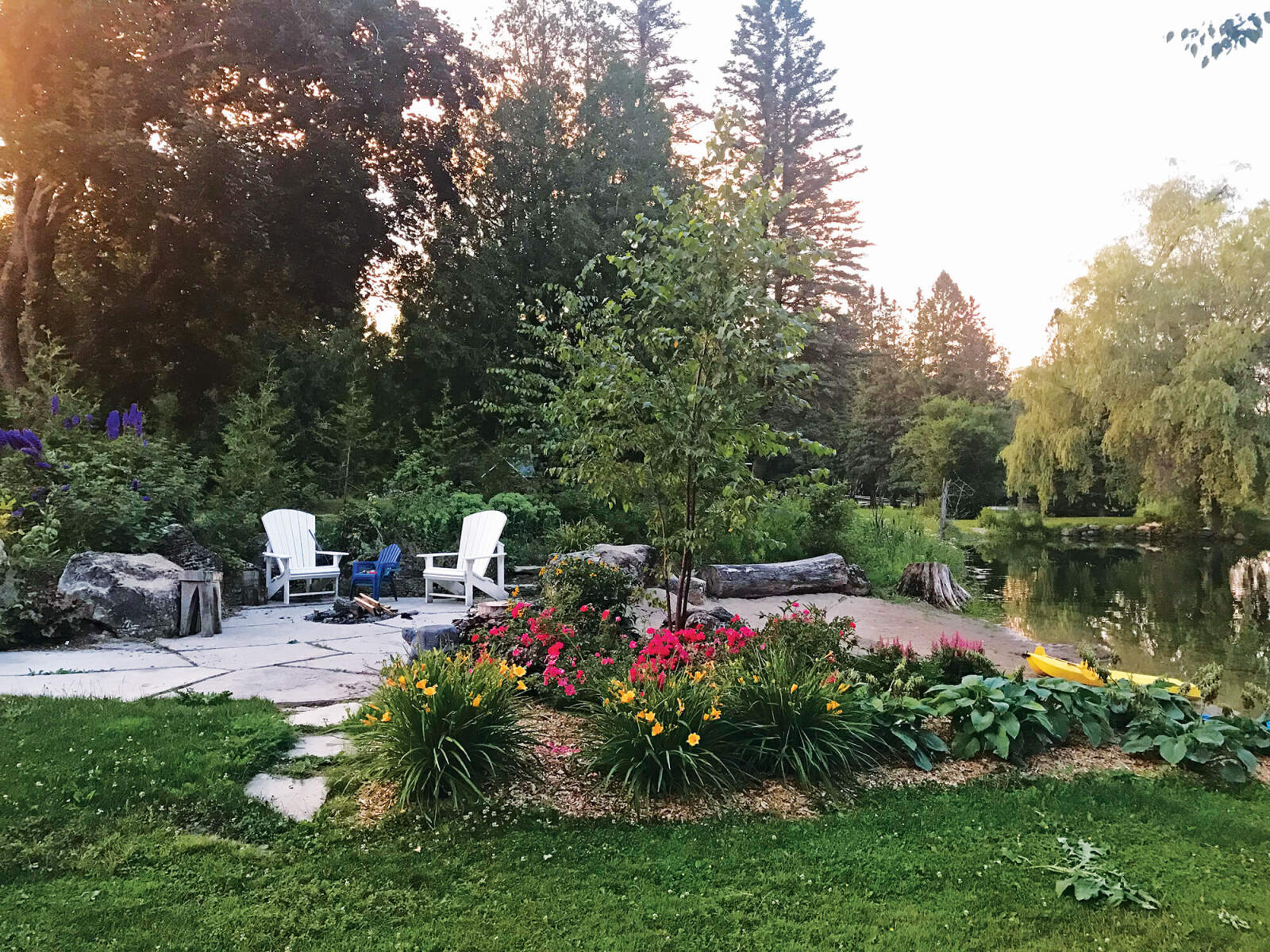 A redesigned and reconstructed sustainable  ecosystem designed by Randy Tumber features  biological filtration, floating wetlands technology  and waterfalls, surrounded by many natives  including cedar, birch and dogwood — with some  ornamental embellishments, of course.